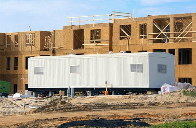 construction workers meeting at office trailers on rent in Wixom MI